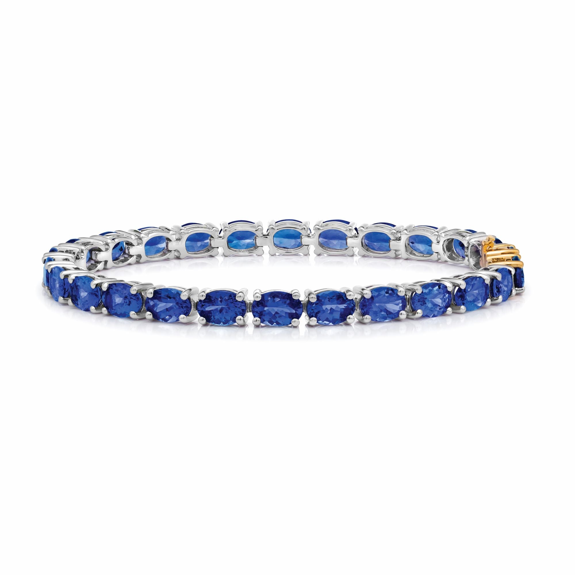 Oval Shaped Tanzanite Bracelet set in 925 Silver with a 14k Yellow